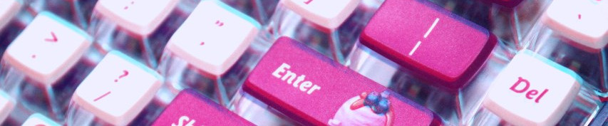 A mechanical keyboard with white and pink keys. Original image by Ivan Lopatin on Unsplash.